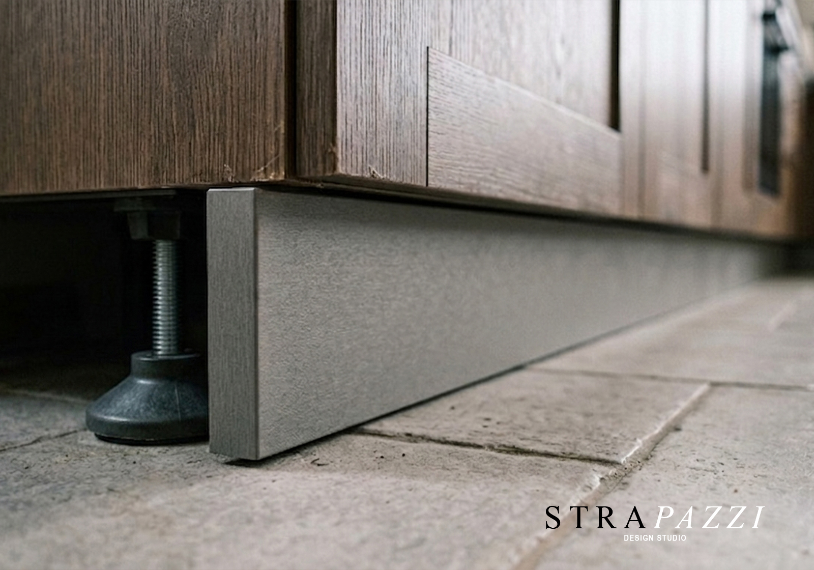 Detail of adjustable feet and kick plate