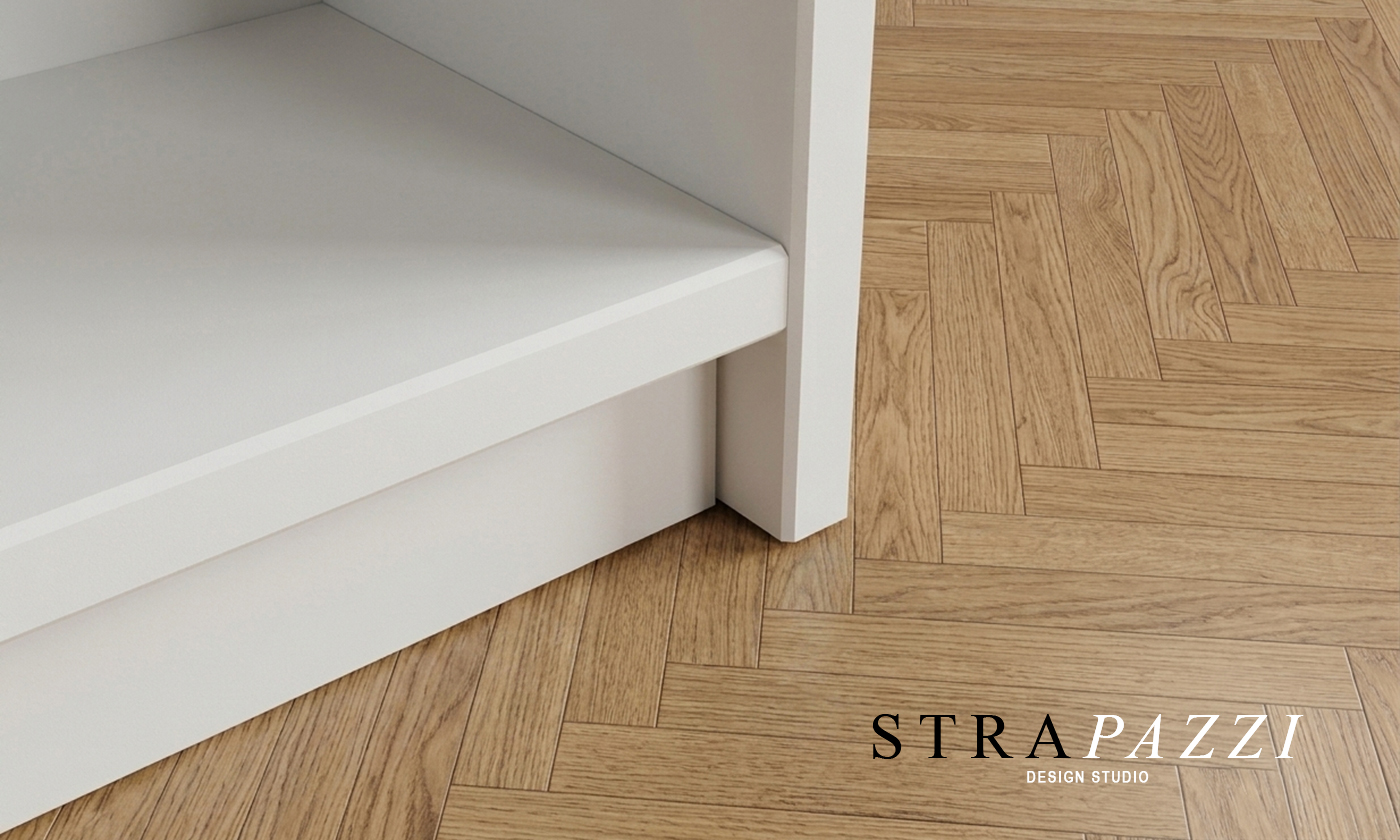 Kick plate recessed relative to the cabinet sides
