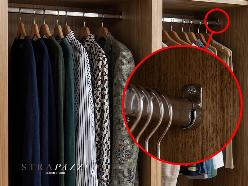 Interior of a wardrobe with hanging rail and drawer unit